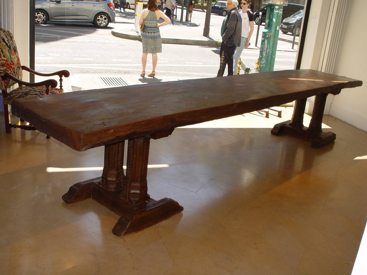 Huge castle furniture table.
Top in walnut and base in chestnut tree,
Spain,
Late 16th-early 17th century.
Dimensions: L 169in x D 30in x Ht 30.7in x top thickness 4in.
Service restoration. 

Huge Spanish table with one piece top and double