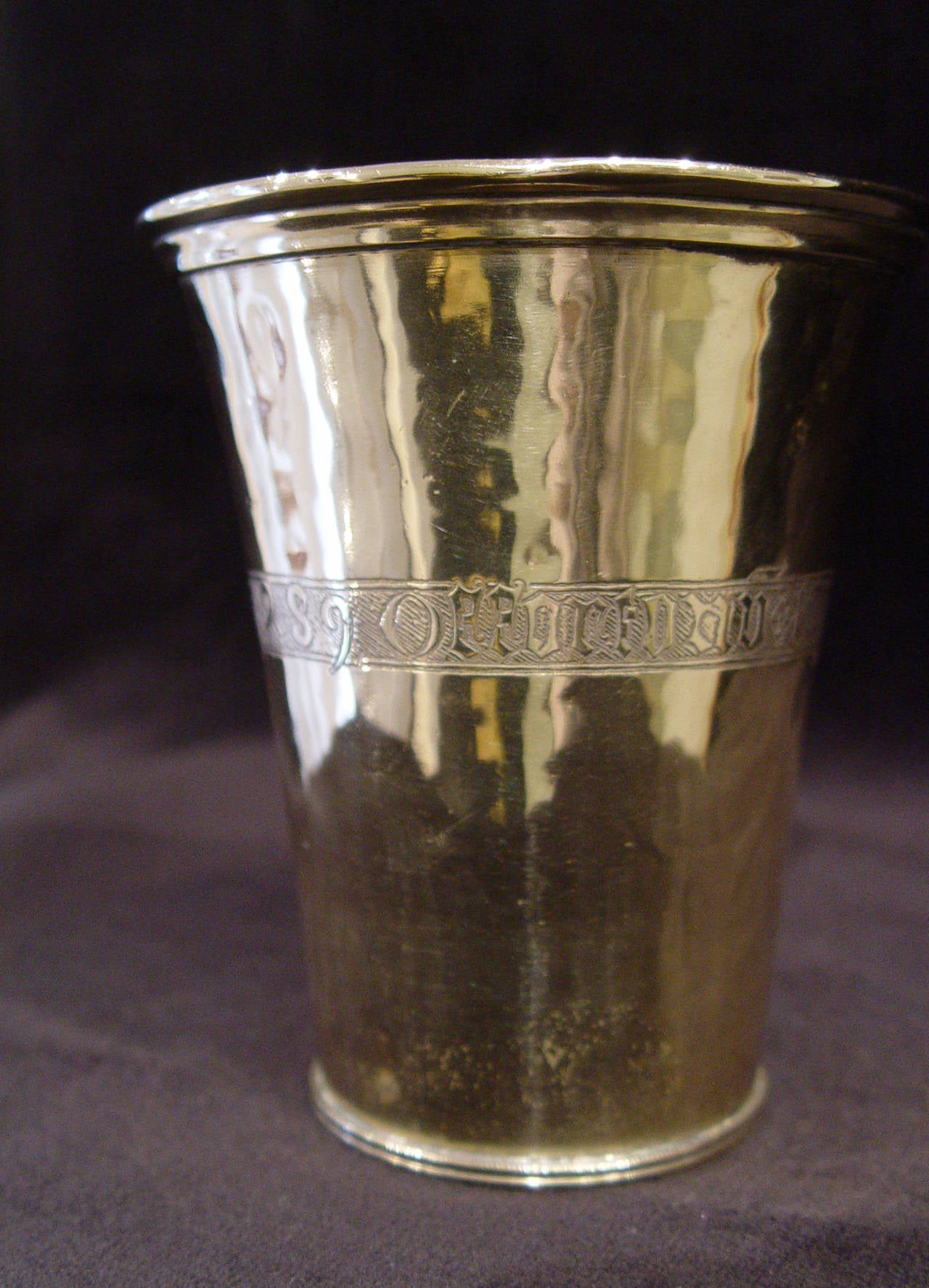 Engraved copper goblet, dated 1480, with a mark underneath.
Gothic writing
Ex. Nicolas Landau collection

The brass-ware / dinanderie : « an art in the making « 
 In the Meuse valley, the knowledge of Dinandiers and their workshops of metal