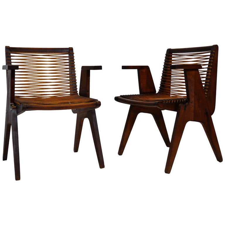 Original pair of Klaus Grabe armchairs. Plasticated rope seating. 
Classic silhouette.