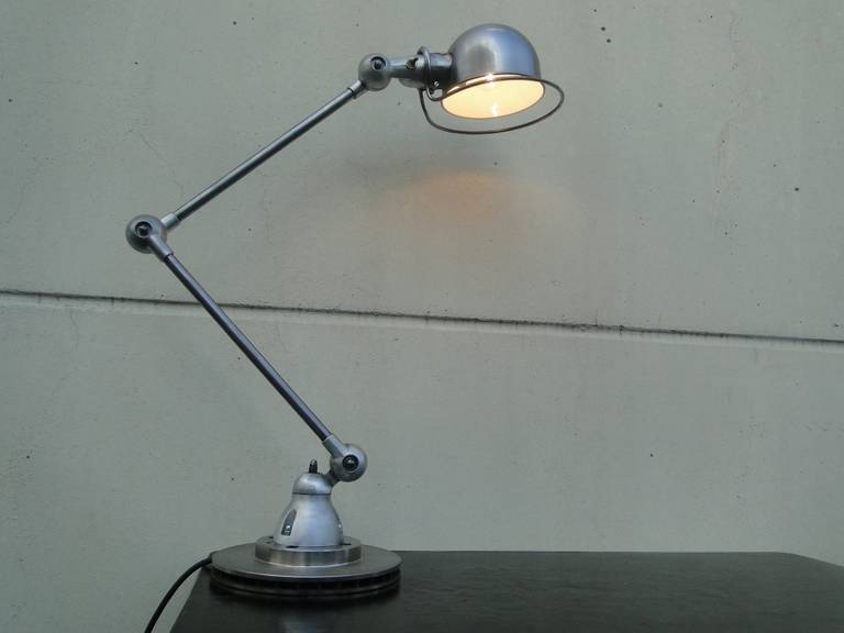 Two-arm French industrial Jielde lamp
designed by Jean-Louis Domecq in the 1950s
This Authentic Jielde was graphite polished very carefully

two arms each 15.7" / 40cm
total height adjustable 41"/105cm