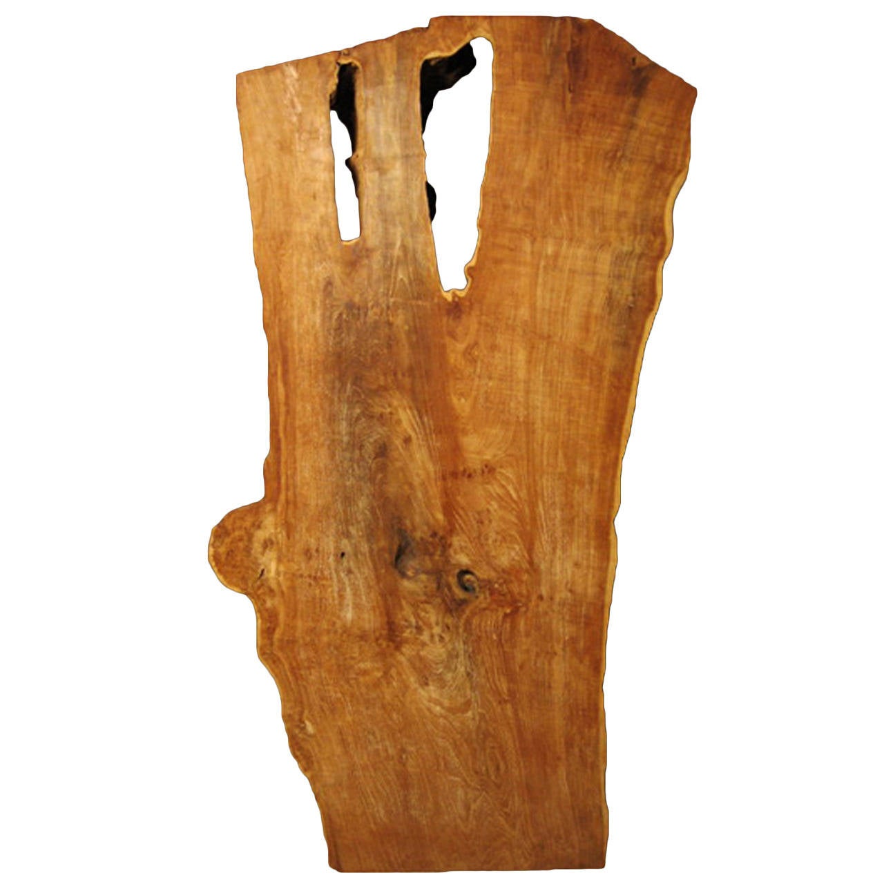 A remarkable piece of reclaimed teak showing the natural exterior surface and hand planed wood grain, from Indonesia