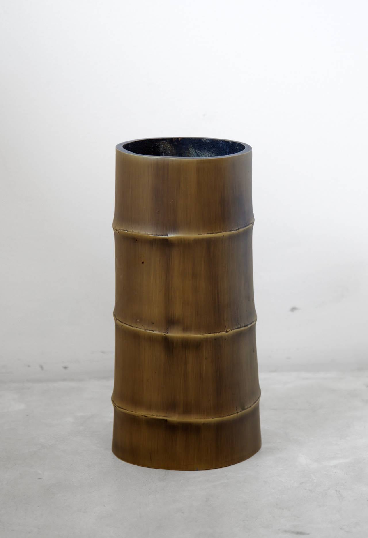 contemporary Aluminum Cast Bamboo vases
with bronze finish
a set of 4
one vase 5