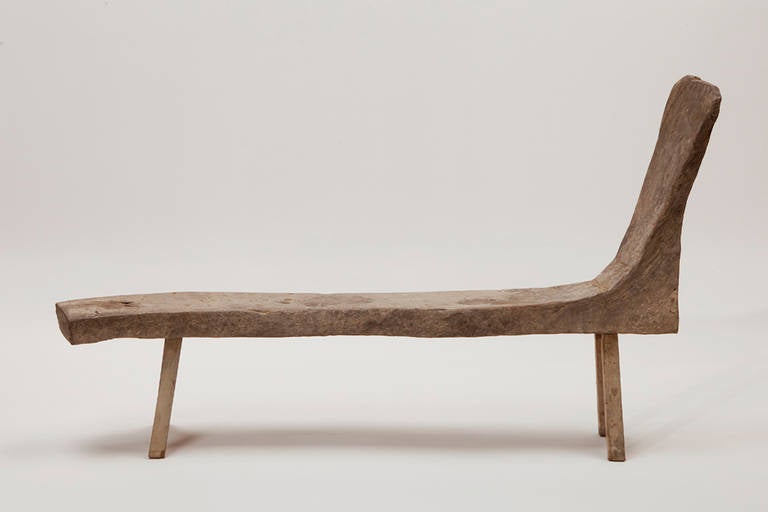 A fine Primitive bench. Solid teak, fine patina. From Java, early to mid-20th century.