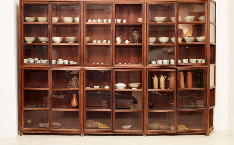 Old Chinese pharmacy cabinet made out of teakwood with handblown glass from Java, Indonesia.
The combination of the colossal size and delicacy of the details is unique and rare.
Some original glass pieces are missing and will be replaced.