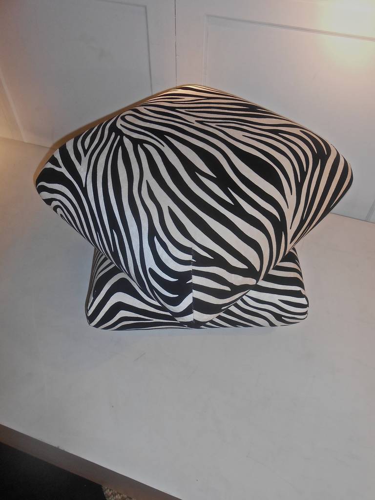 on rolls, mechanism to turn the top pillow ,totally reupholsterd with a zebra fabric by " LELIEVRE " France