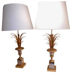 A Neo- Classical Pair of Brass Lamps