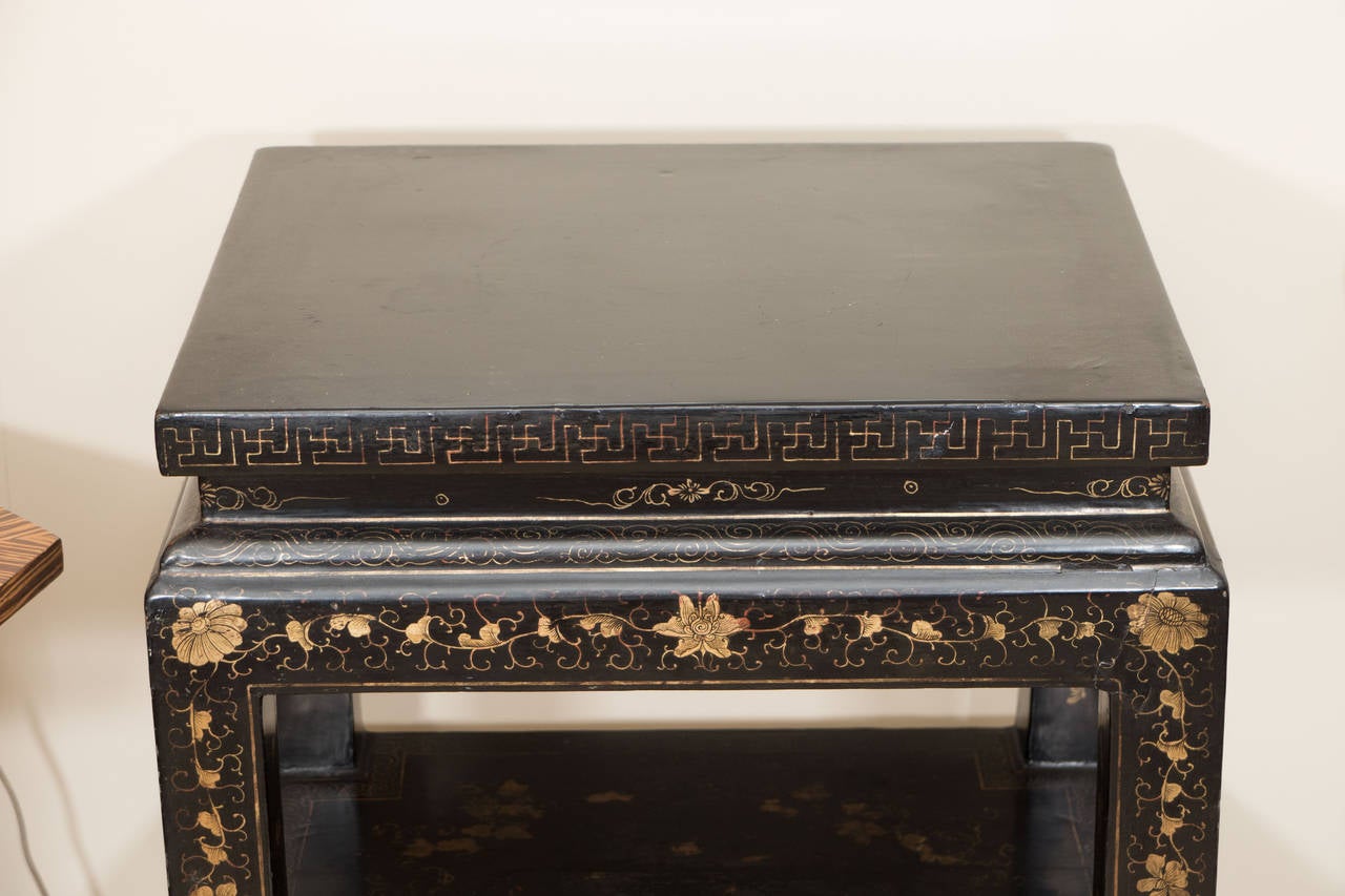 Pair of Chinese Lacquered Consoles with Gilt Detail