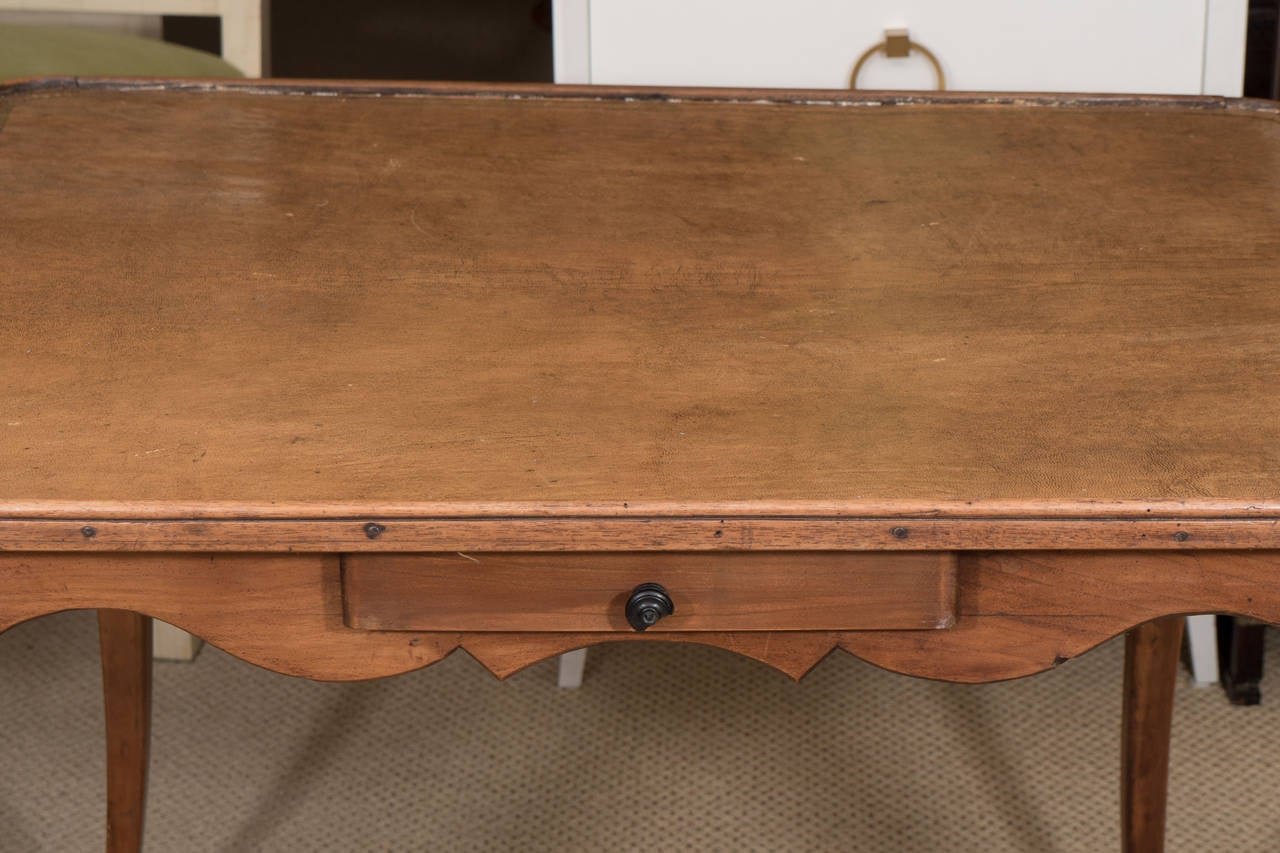 French antique leather top games table.