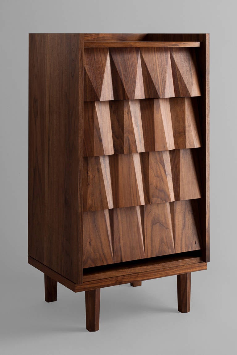 This chest of drawers evokes the bold design principles of brutalist architecture, with its overscaled geometrics and accentuated sharpness. The result is a gorgeous piece that celebrates the beauty of expressive form, and stands out in any room.
