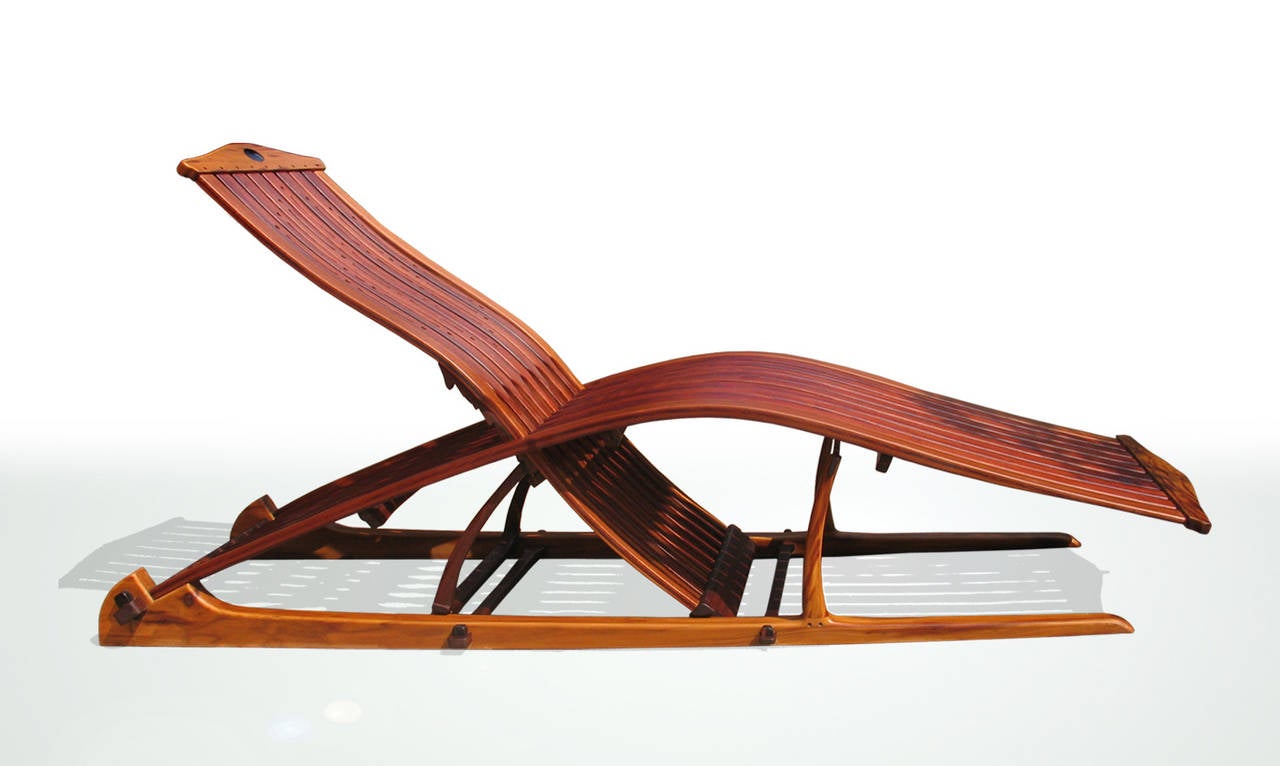 Juan Tamad is the marriage of architecture, woodworking and a visionary aesthetic. The seat and backrest are connected in dramatic swaths of ipil and yakal, sweeping across the base of molave and stretchers of dungon. The back pitch can be adjusted
