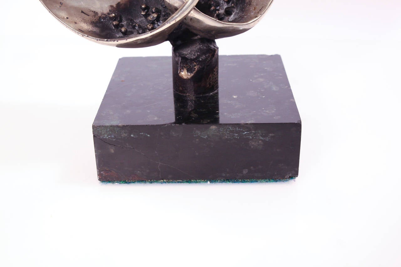 Chromed metal on stone base, Untitled, executed in the 1970s.

Dimensions: H 11.75