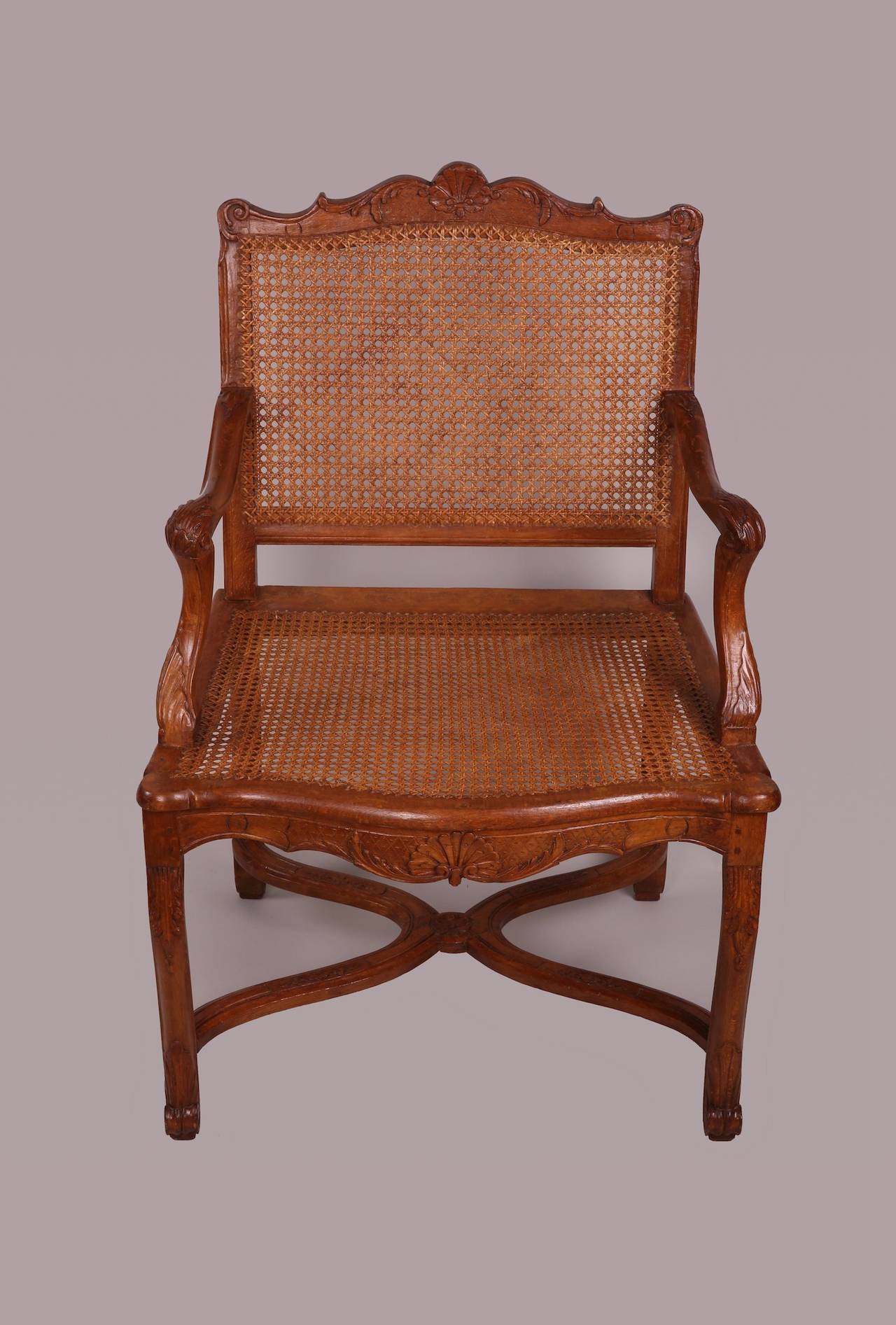 Suite of Four Caned French Regence Armchairs 