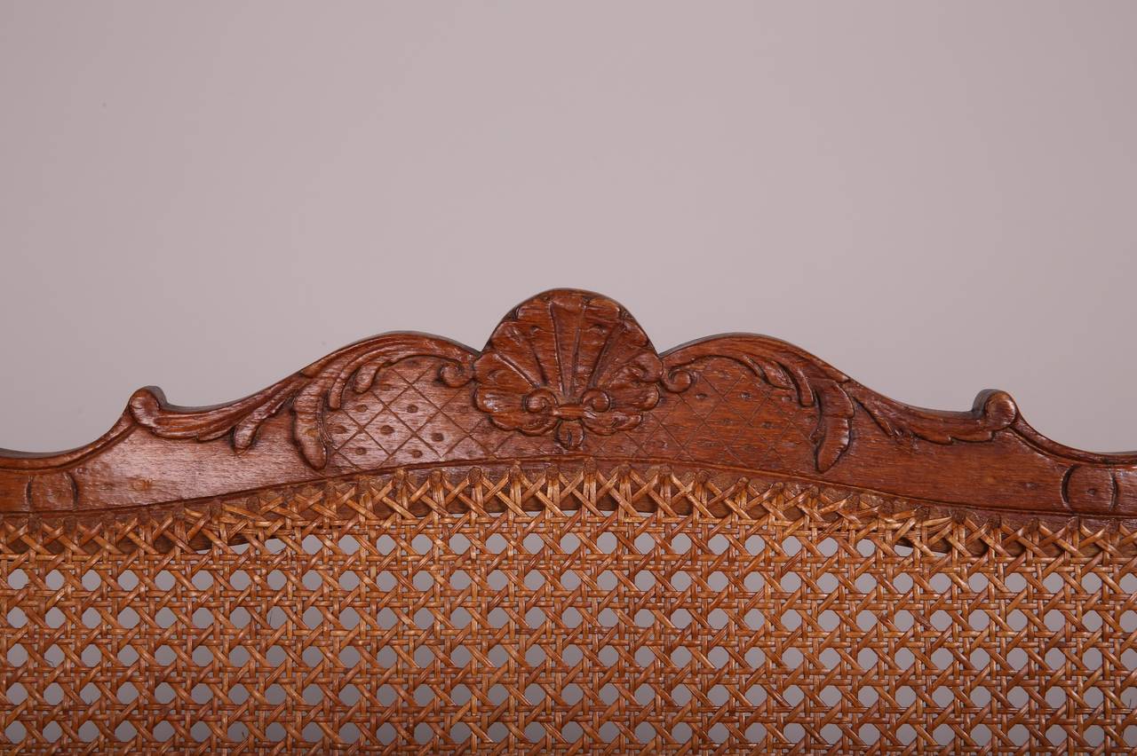 Suite of Four Caned French Regence Armchairs 