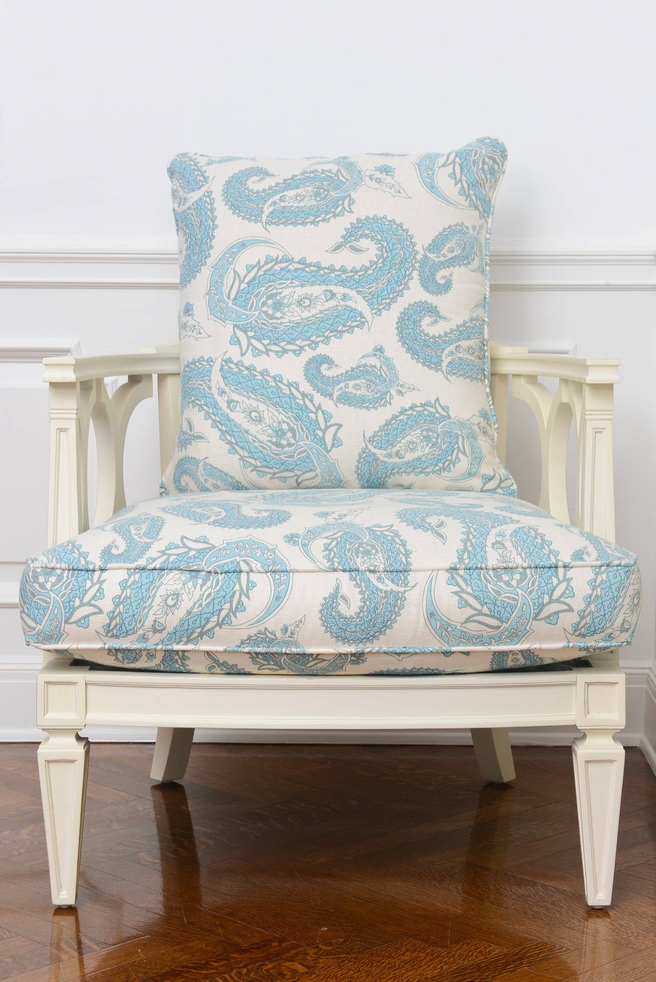 Glamorous Hollywood Regency style armchair.  With blue paisley seat and back cushion.