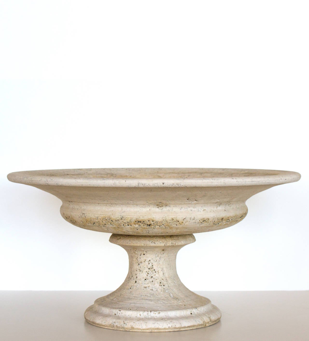 A classical garden urn made from cast stone.