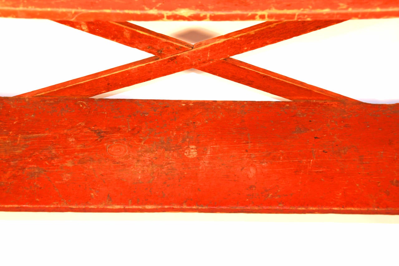 American 19th Century Pennsylvania Painted Pine Bucket Bench in Old Red Surface For Sale