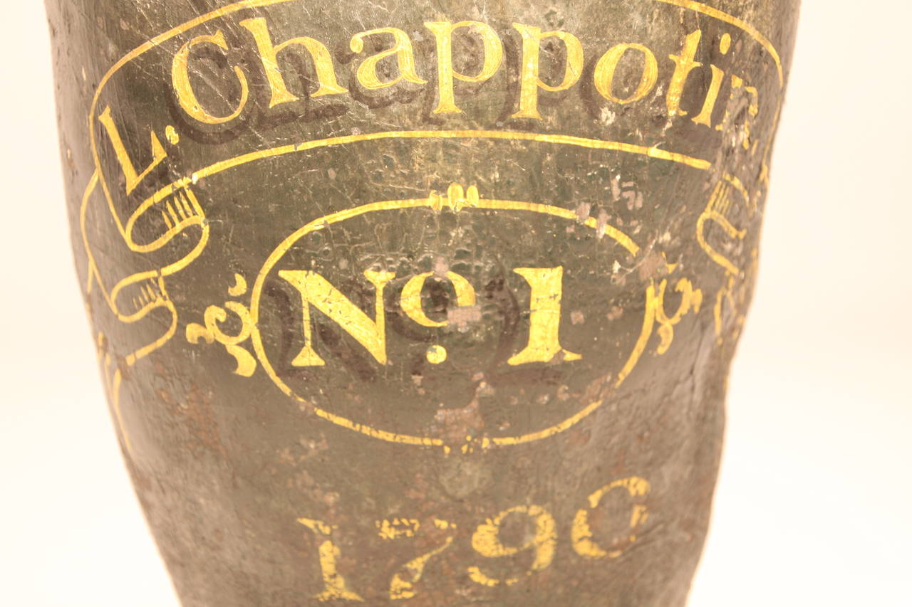 In colonial America, homes had approximately three to five fire buckets hanging near the door, all numbered, in order to start the fire brigade in case of fire. 

This is a fine example of a late 18th century New England leather fire bucket marked