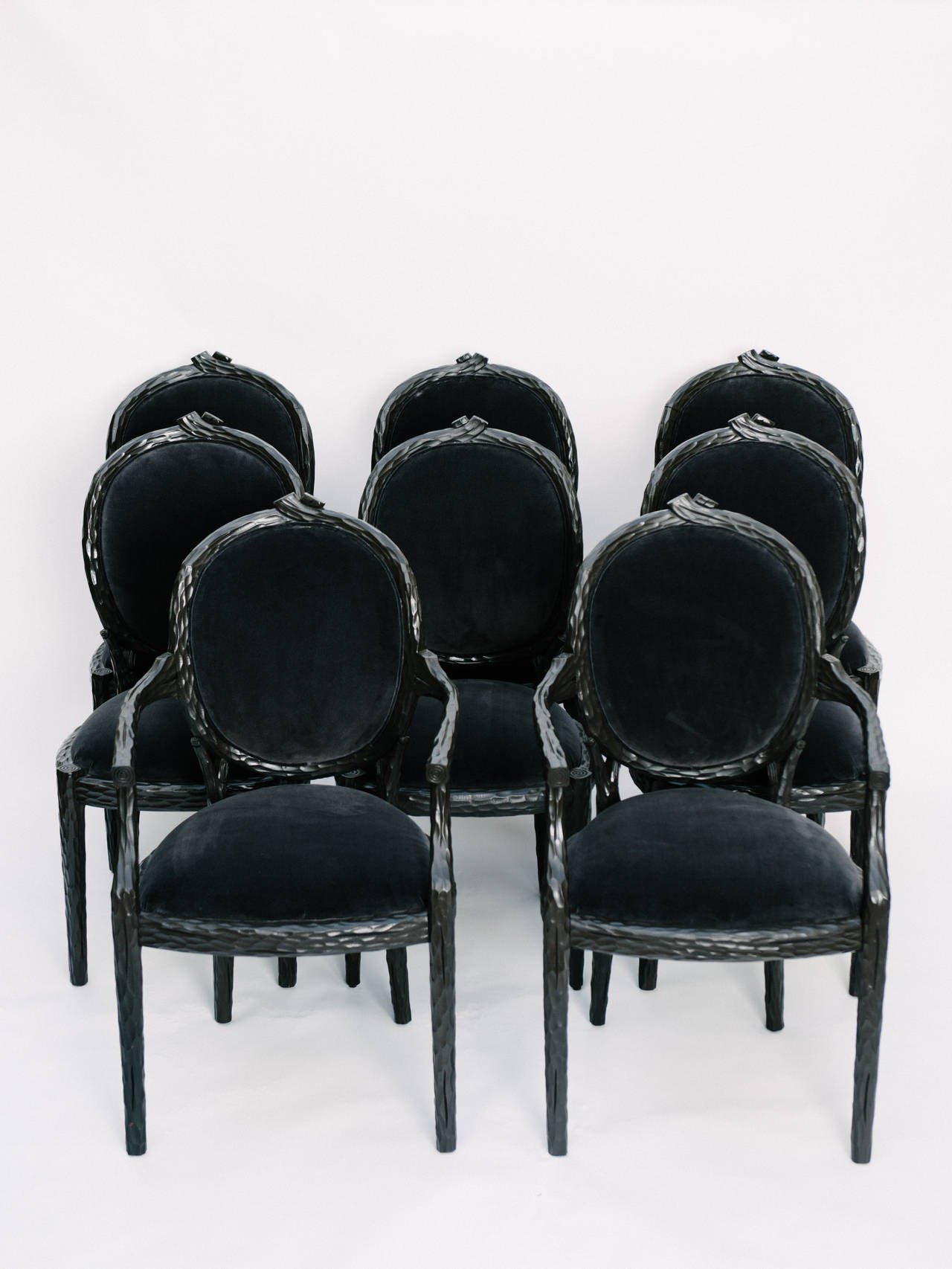 Set of eight Italian dining chairs newly refinished and upholstered in charcoal velvet. Two armchairs and six side chairs.