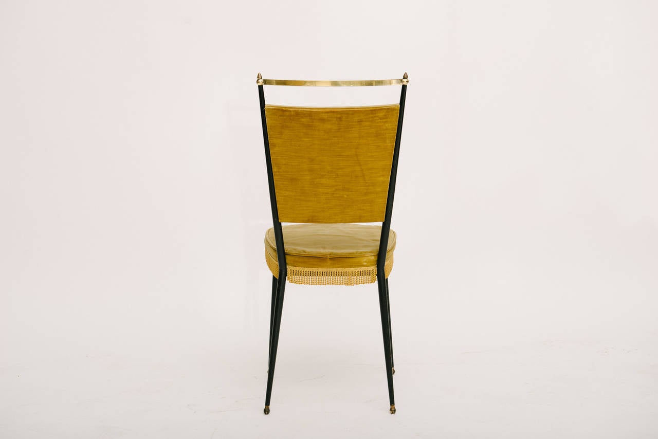 Vintage Gio Ponti style iron and brass chair.