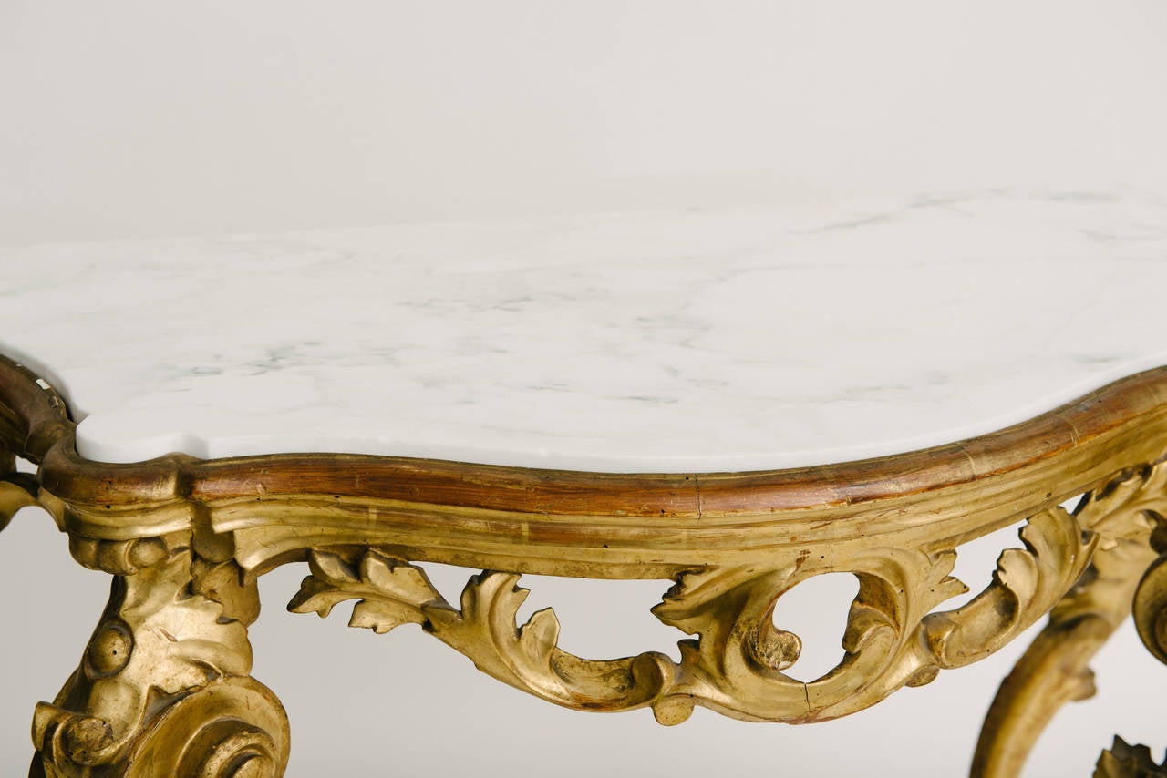 18th century Venetian Rococo giltwood console with marble top.