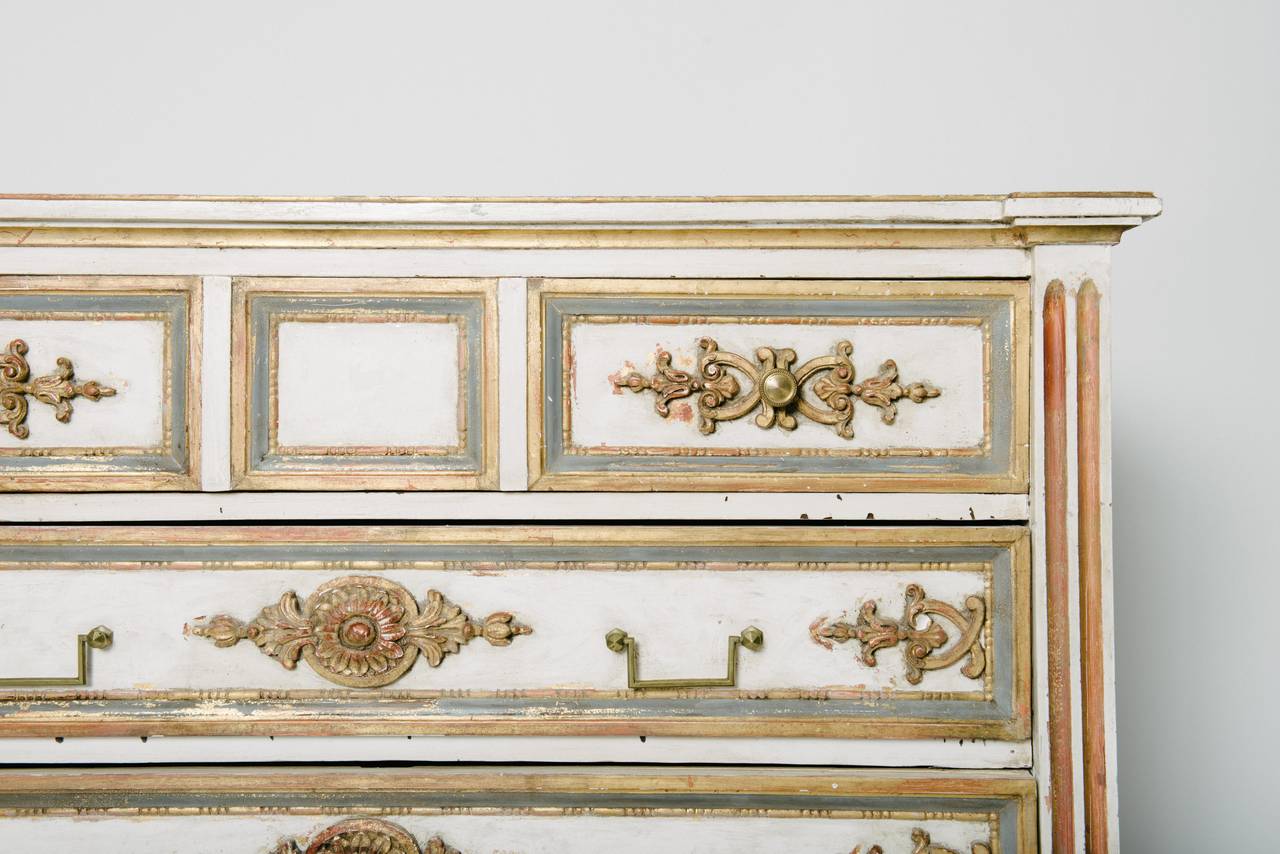 A late 18th-early 19th century painted and parcel-gilt Louis XVI style commode from Lombardy (Torino).