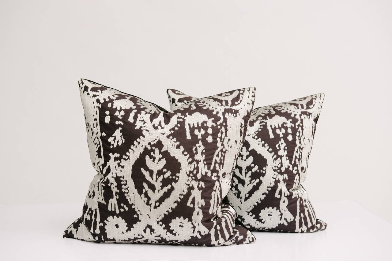 White and brown silk embroidered Ikat pillow with chocolate velvet backing and feather and down fill.
