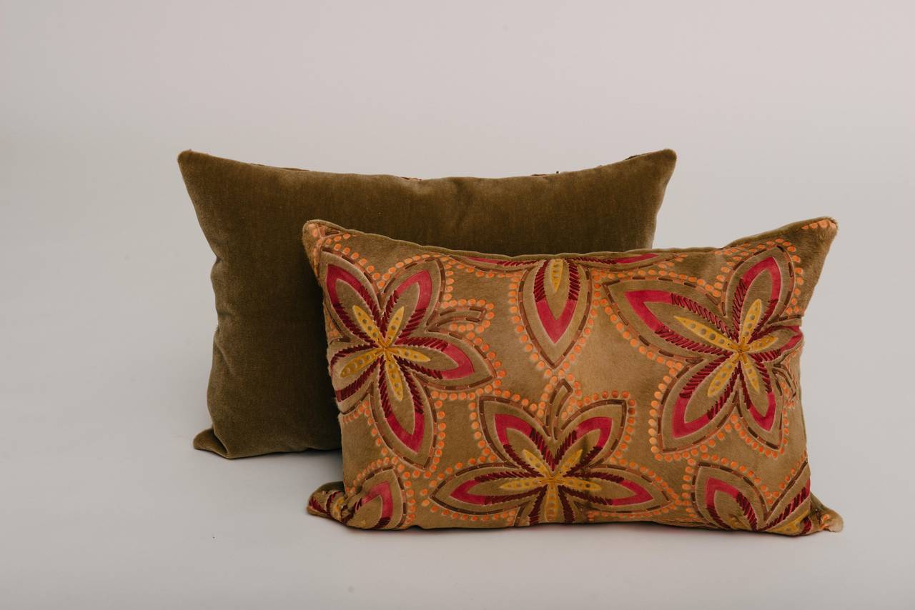 A beautiful Italian laser floral etched calf hide pillow with leather lacing detail and backed in a fawn mohair. Two available, price is per pillow.