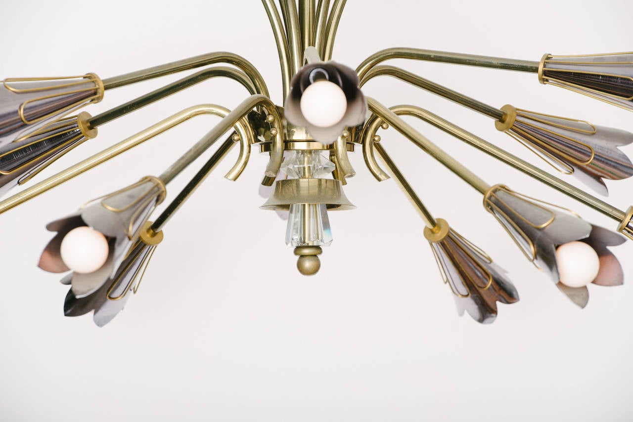 Mixed polished steel and brass Italian eighteen-light chandelier. Newly wired for U.S. market.
