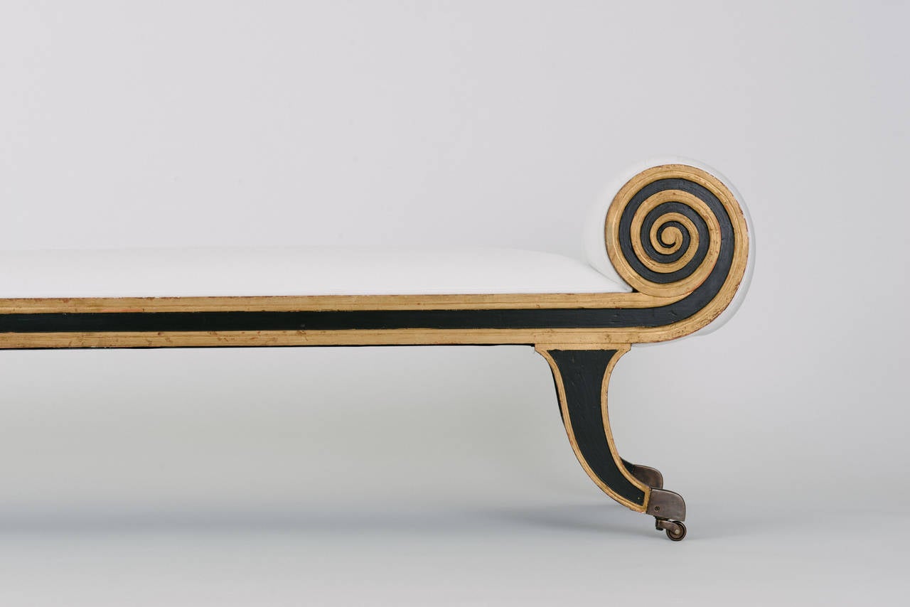 A painted and giltwood Federal style banquette.