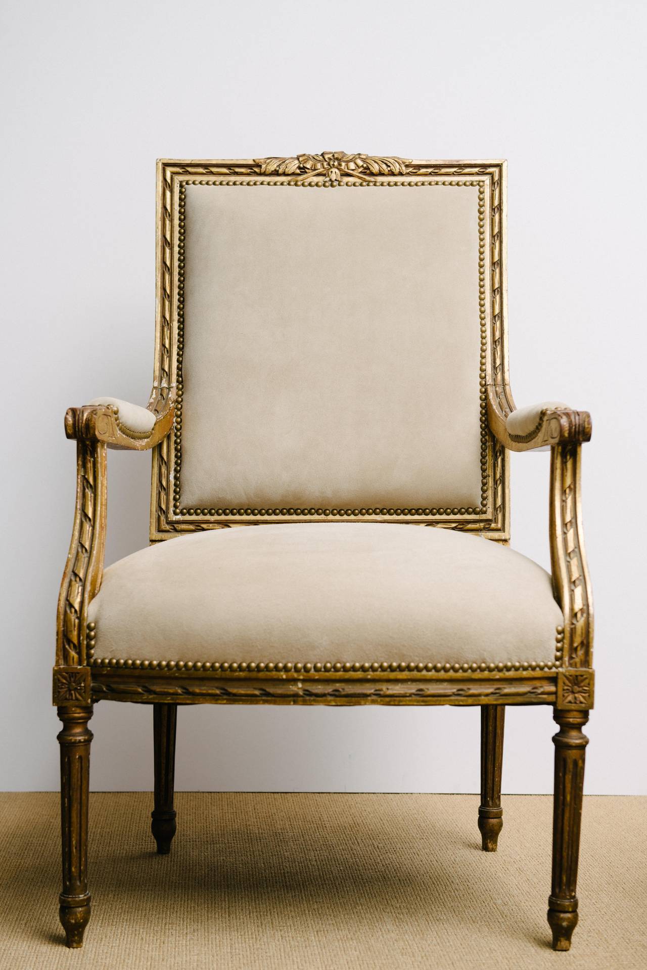 French Pair of 19th Century Louis XVI Style Gilt Fauteuils
