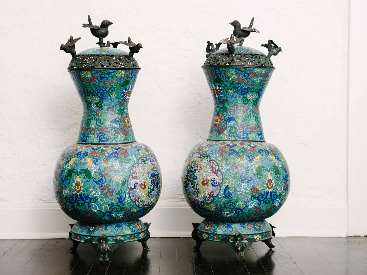 Pair of late 19th century Chinese bronze cloisonné urns with lids