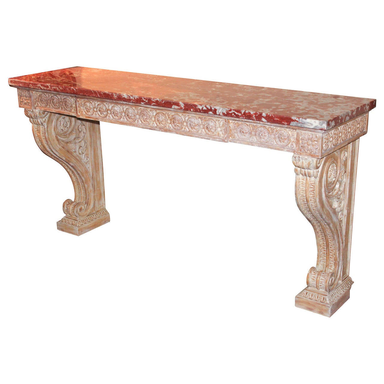 Beautiful hand-carved wood and gesso French Louis XIV console. Having lovely scrolling motif legs, rosette design across apron, and gorgeous rouge marble top. Ready for your designer touch!