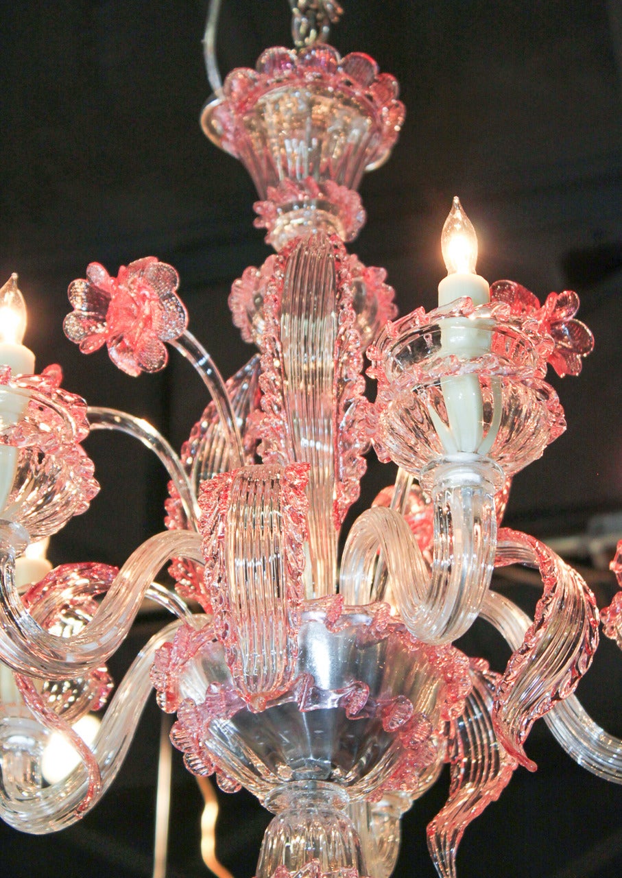 Delightful early 20th century Murano hand-blown glass 5-light chandelier. Having beautiful clear and rose colored glass leaves and flowers, and gracefully curved glass arms that terminate in large bobeche cups.  Ready for your designer