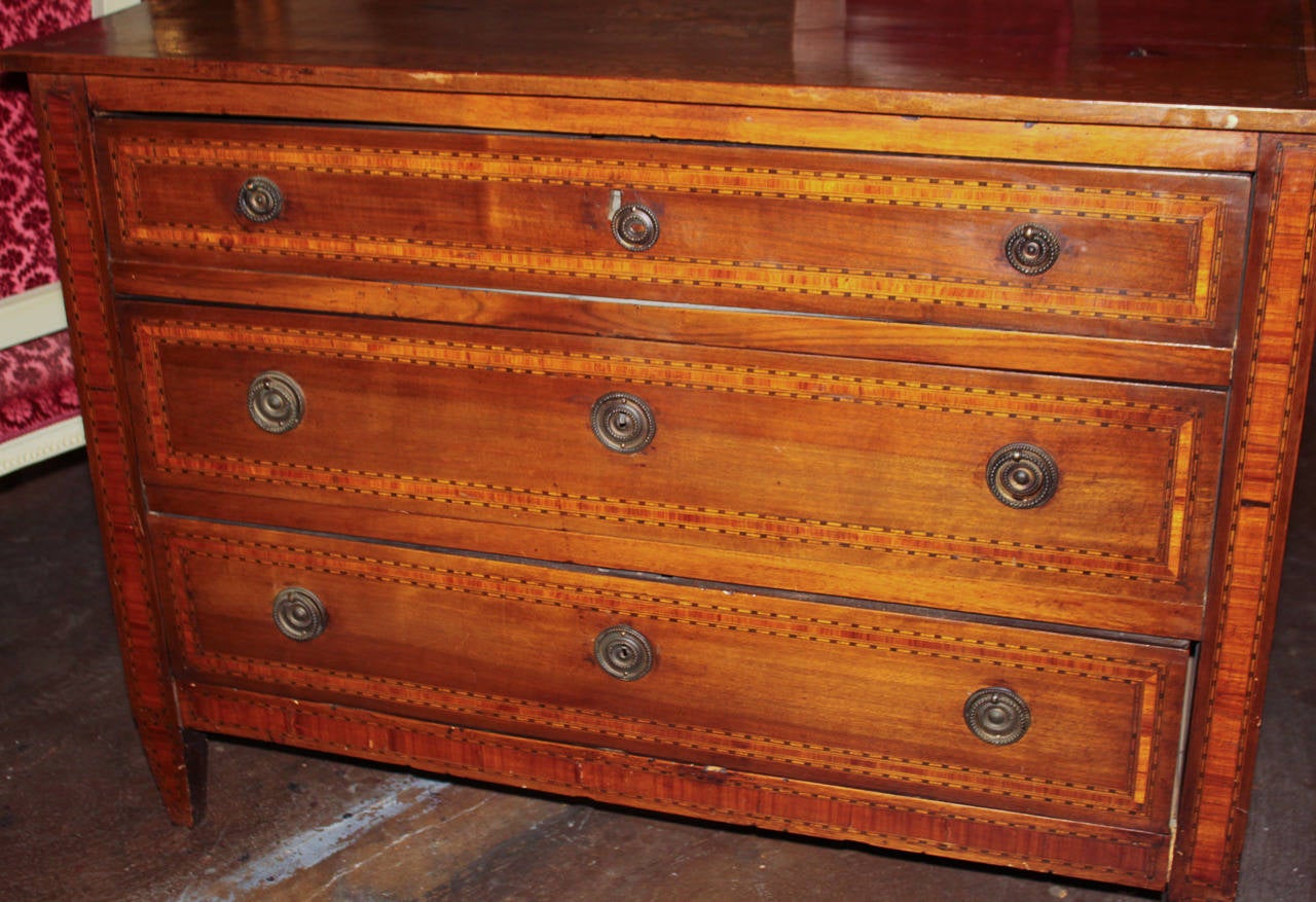 Fabulous 19th c. Italian chest with parquetry inlays.  Having 3 inlaid drawers, bronze hardware, and acanthus leaf motif inlay on top.  Exhibiting a wonderful patina with classic lines to suit a variety of decorative styles!