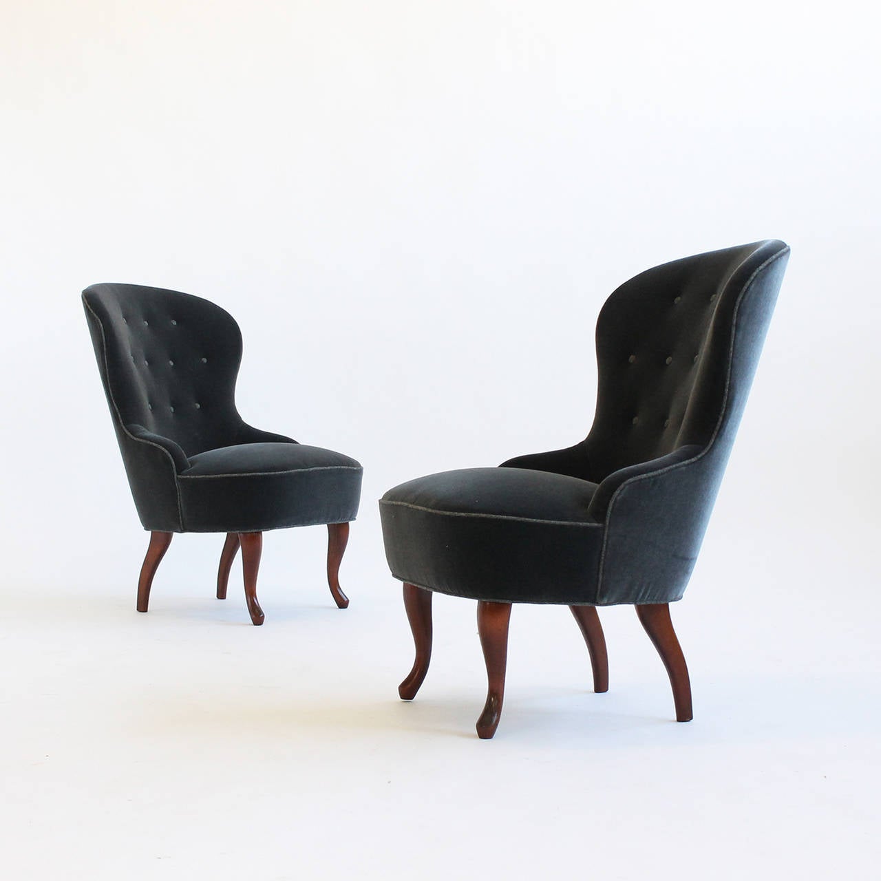 Vintage pair of Swedish slipper chairs. Newly restored and upholstered in a slate blue mohair.
