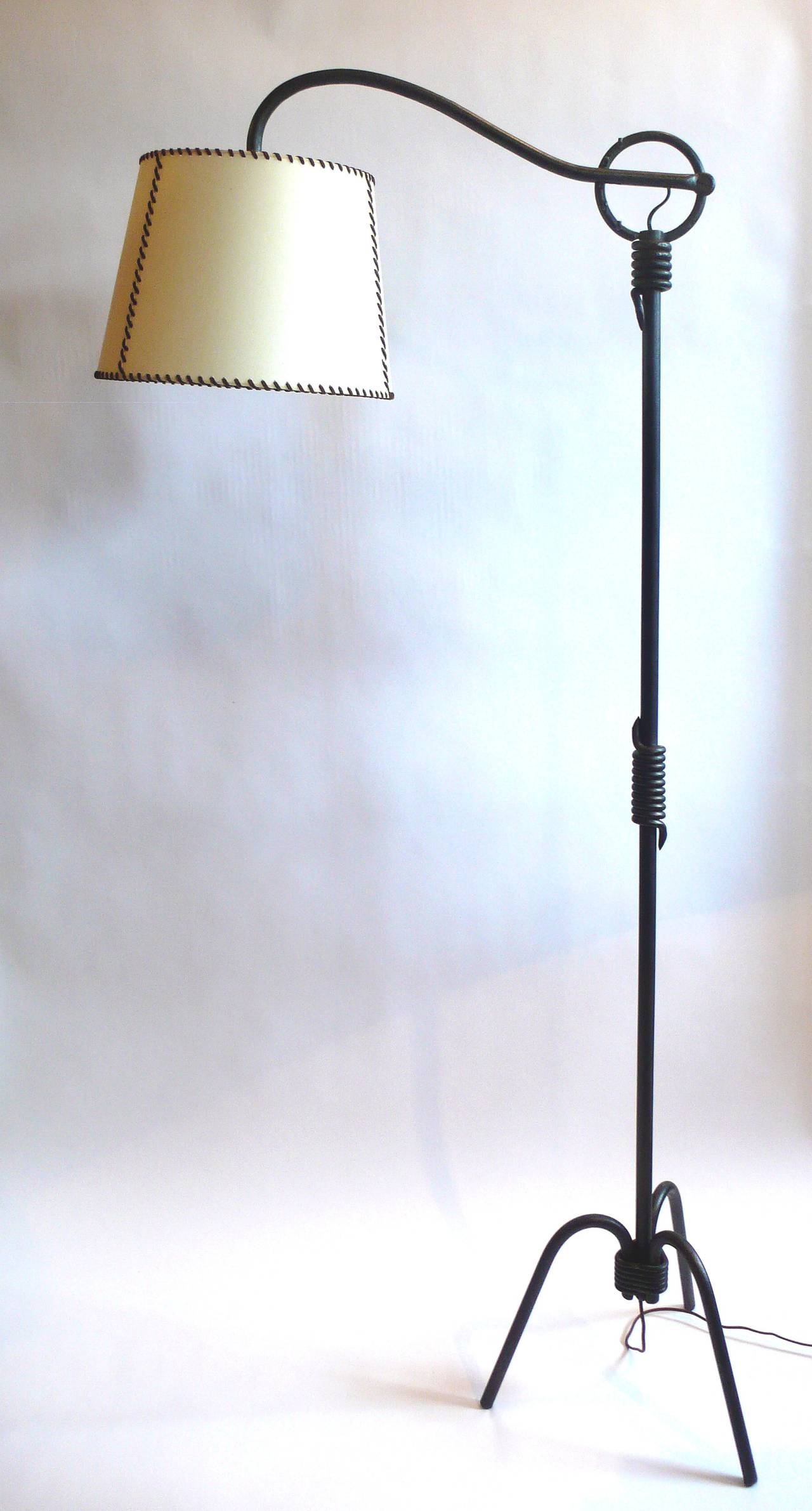 Floor lamp in iron with adjustable arm and lamp in the style of Jean Royere