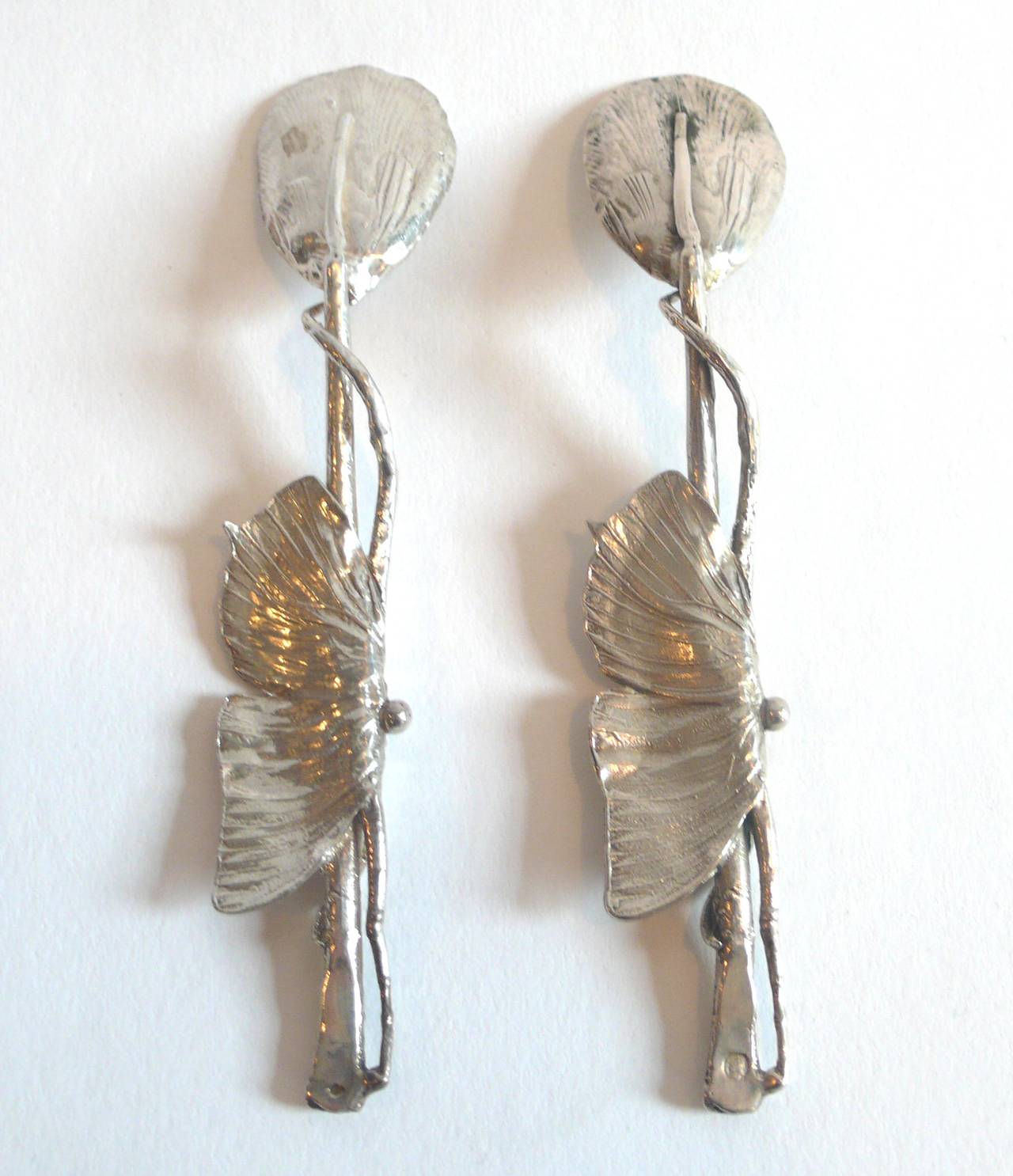 Pair of Claude Lalanne sterling silver spoons with butterfly motif. Part of flatware service designed for Alexander Iolas, circa 1966.