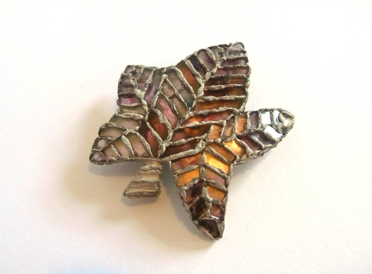 Line Vautrin talosel and multicolored encrusted glass brooch in the shape of a leaf.