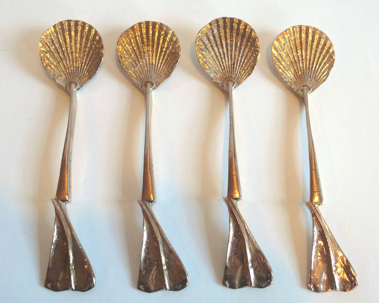 Set of four gilt bronze spoons by Claude Lalanne for Artcurial.

1991.