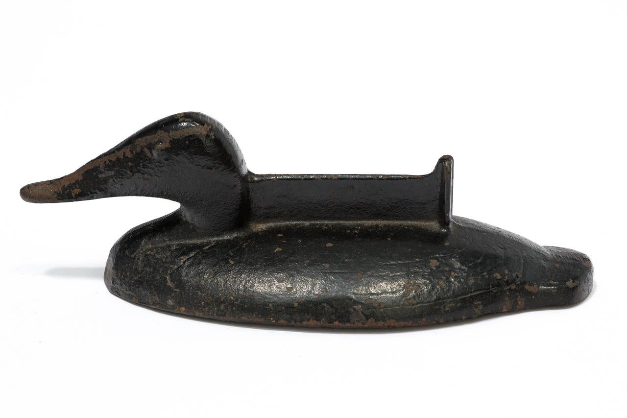 Antique cast iron Duck boot scraper with original paint.