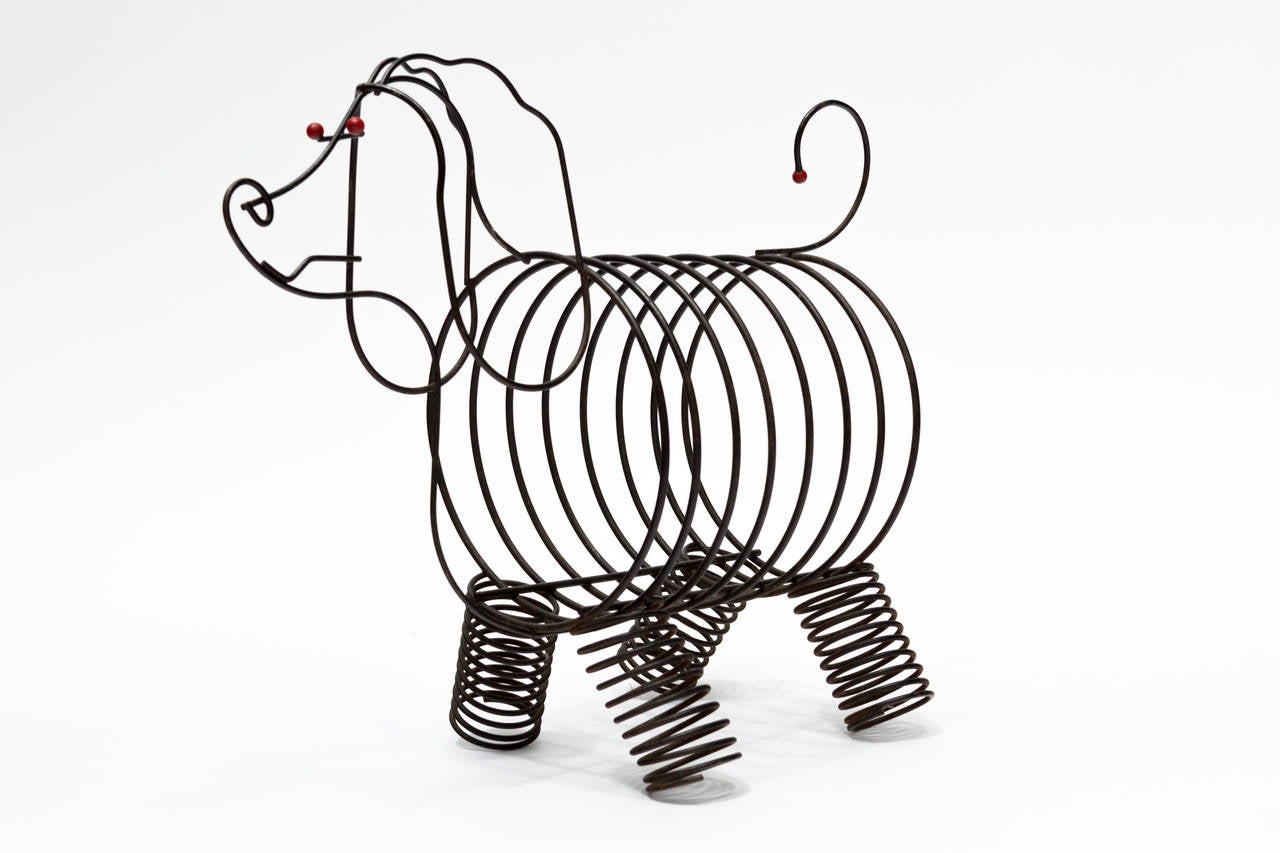 Whimsical Weinberg magazine rack from the 1950's