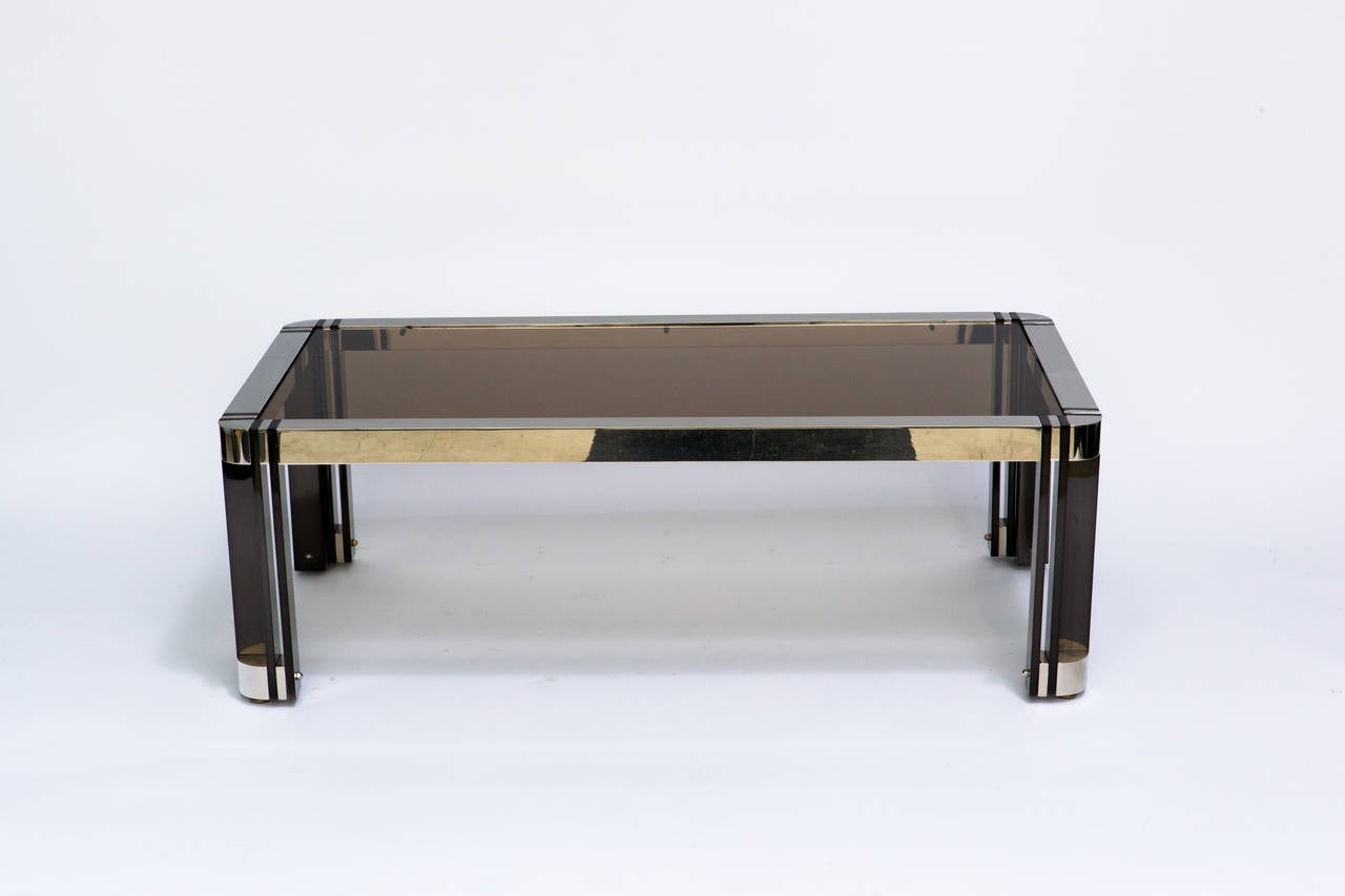 Gunmetal and polished nickel coffee table with smoked glass top in the manner of Karl Springer.