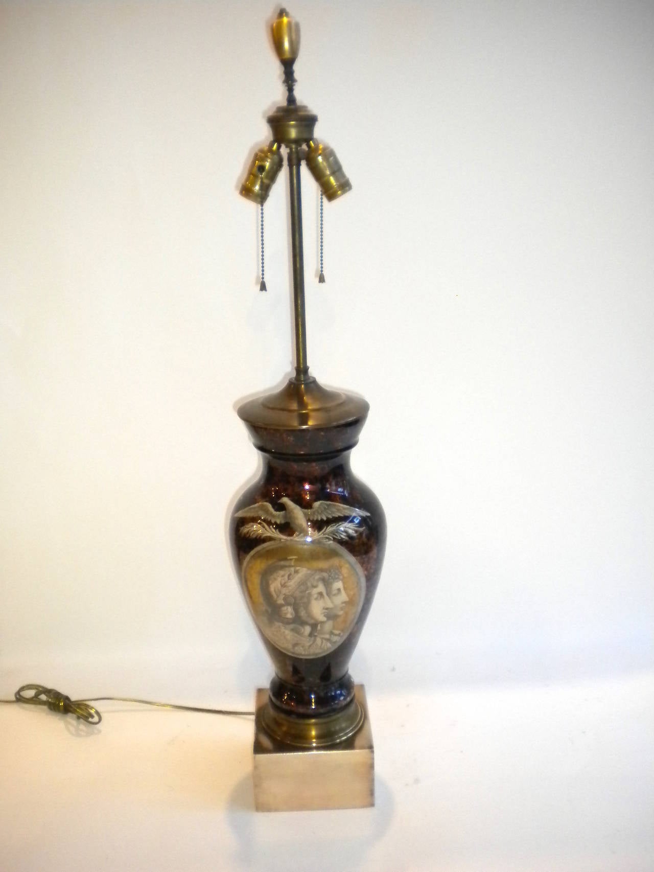 1950s églomisé lamp of classical figures. 

Height to finial is 38 inches.