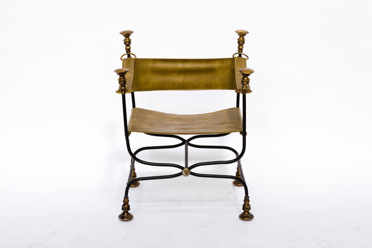 Iron and vinyl fabric Savonarola chair.