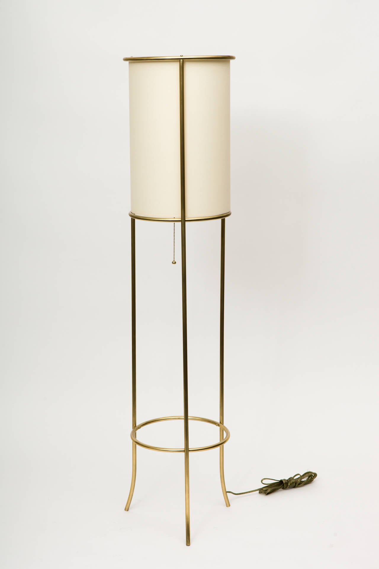 Pair of Tripod Brass Floor Lamps in the Manner of T.H. Robsjohn-Gibbings In Excellent Condition In Tarrytown, NY