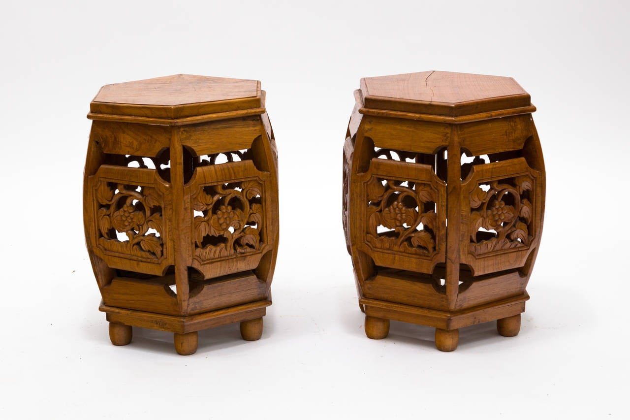 Pair of solid teak Asian side tables or stands.