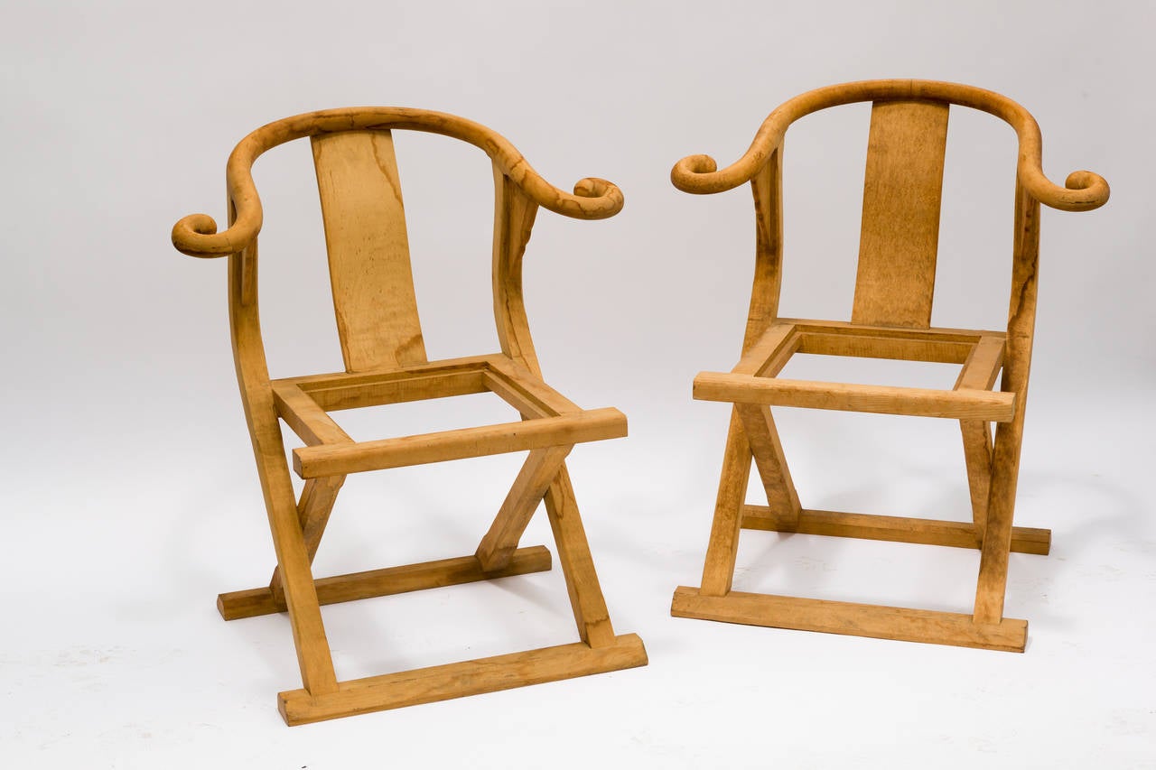 We call them Water Buffalo chairs because of their extreme lines. These 2 chairs are from the 1950s, stripped about 20 years ago. One pair available. 