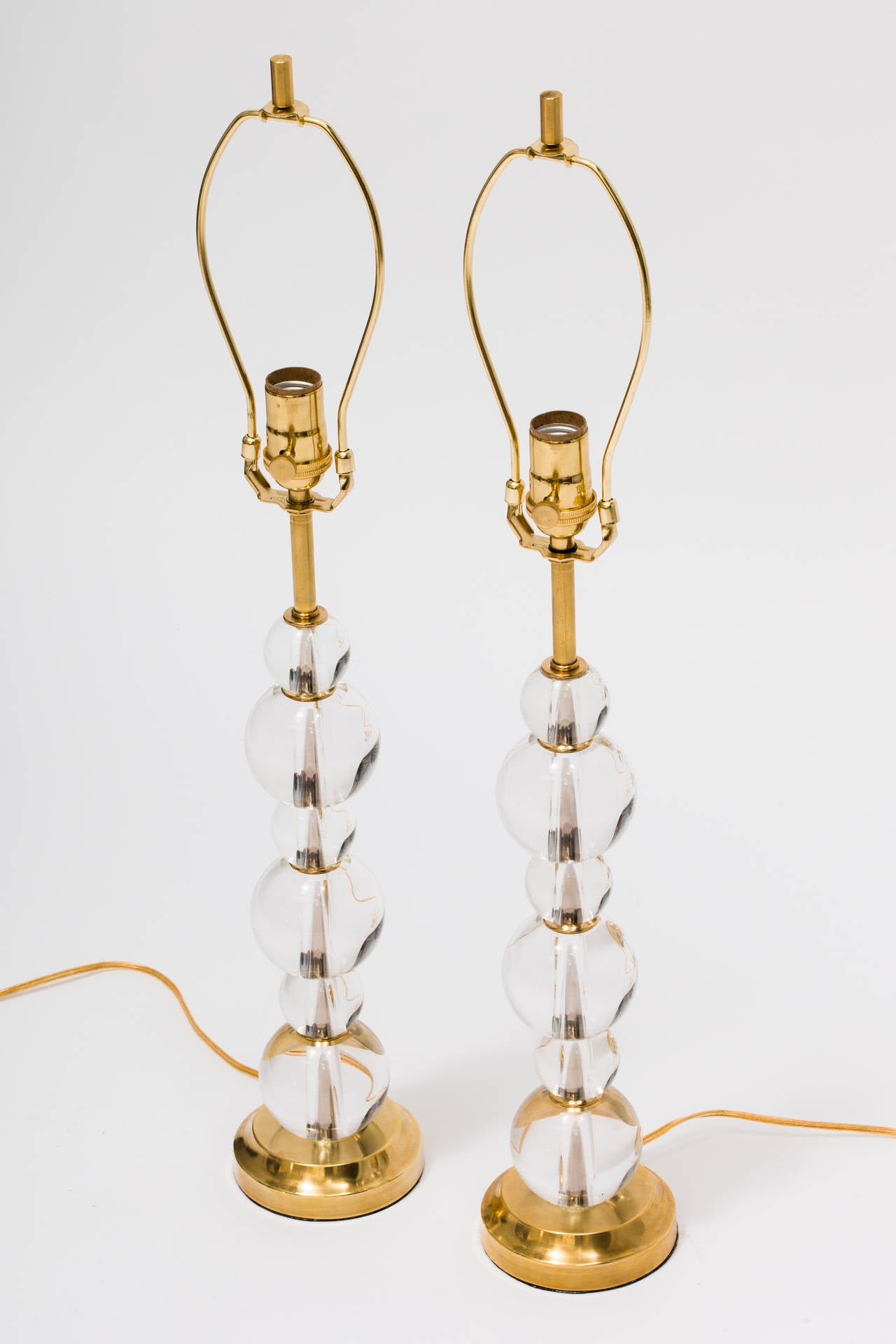 Pair of solid glass balls lamps.
New wiring.
Solid brass hardware.