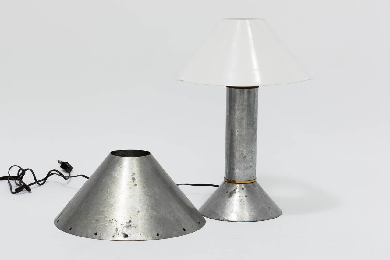 A patinated zinc and brass accent table lamps designed by Ron Rezek,
circa 1980s.
Labelled underneath.