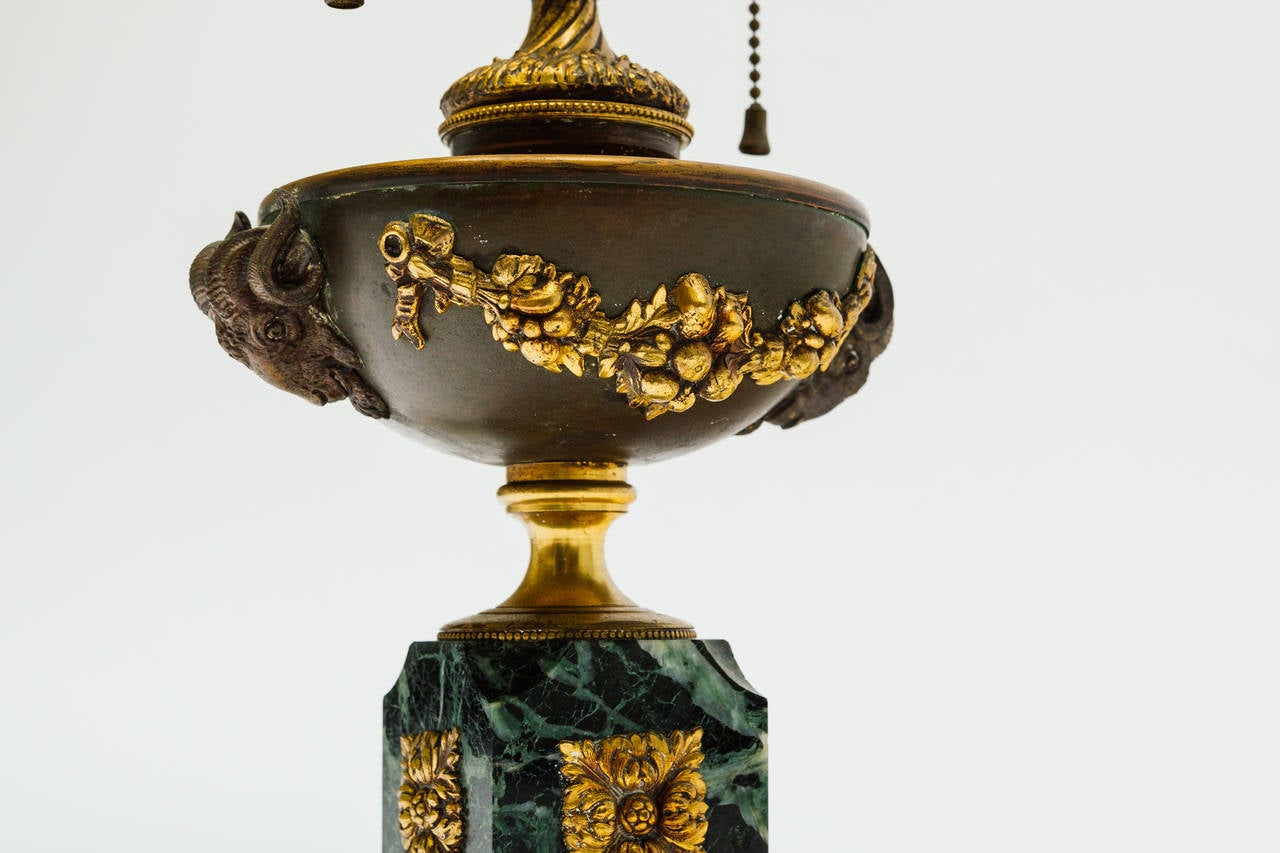Petite marble and copper neoclassical table lamp.

Height is from base to top of Finial.
